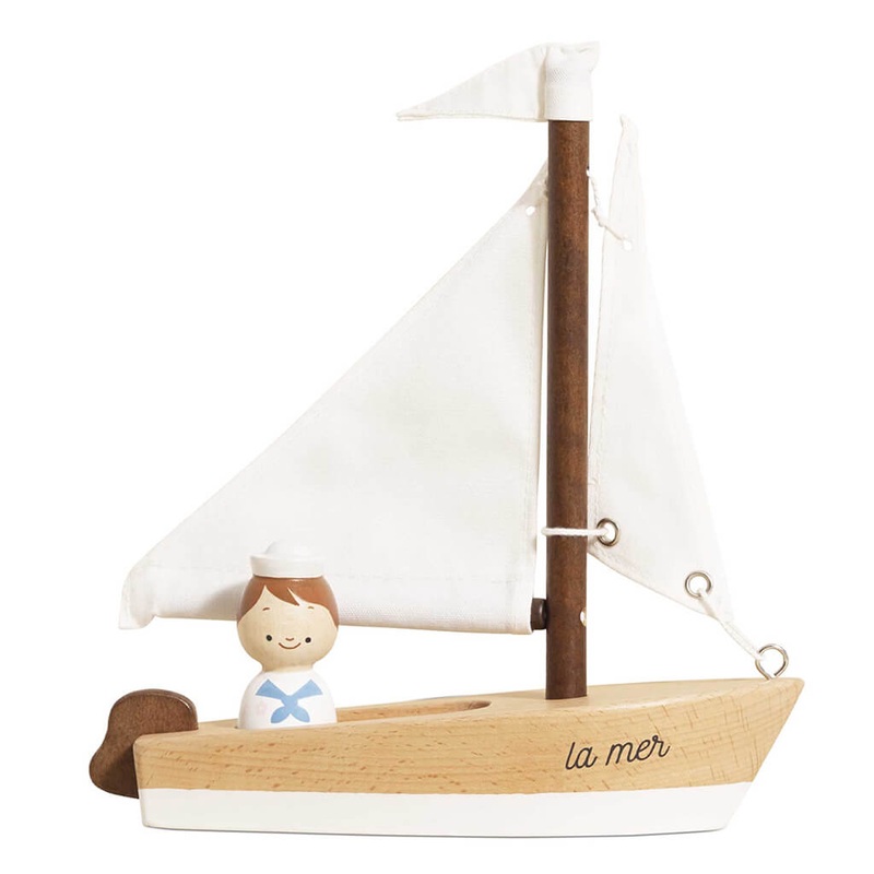 Wooden Sailing Boat and Captain
